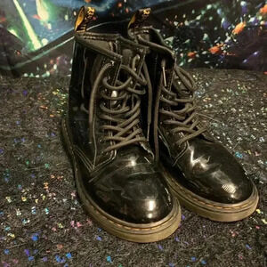 Stylish Black Patent Leather Boots with Zip Closure